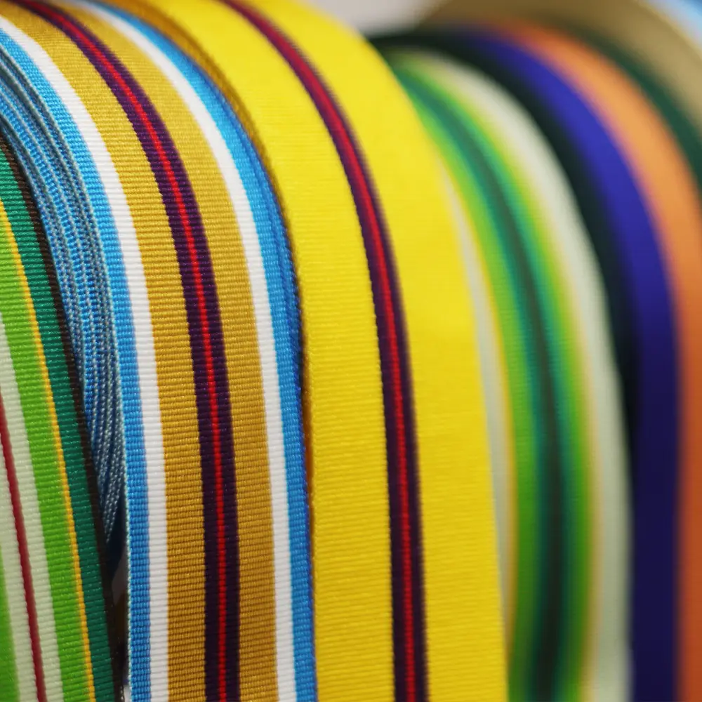Medal ribbon rolls in service colours