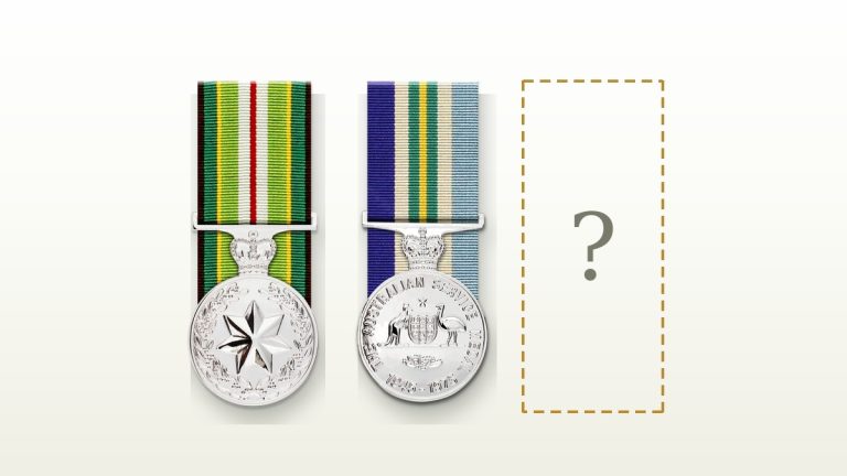 Two court mounted Australian service medals beside a dashed outline marking a missing medal