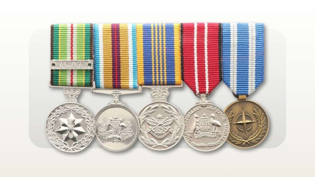 Miniature medal group with Australian service medals followed by a NATO medal